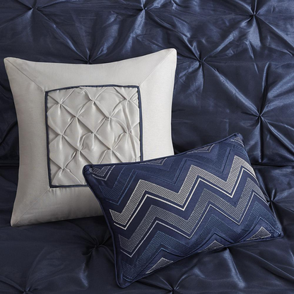 Navy Laurel 7-piece tufted comforter set by Start2Finish with matching pillow shams and decorative bedding accents.