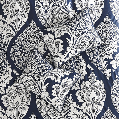 Start2Finish 7-piece cotton printed comforter set with colorful patterns and matching pillow shams on a neatly made bed.