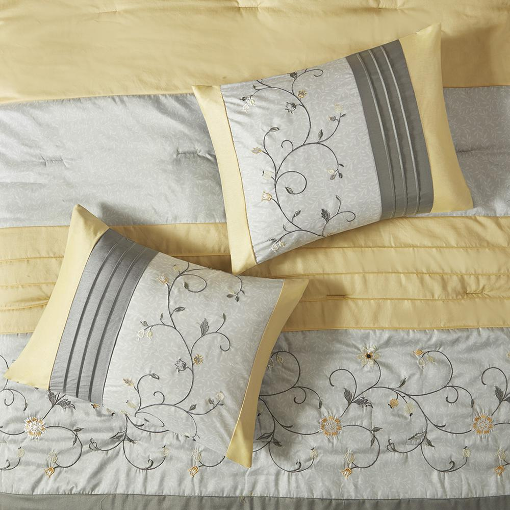 Start2Finish embroidered 7-piece comforter set with floral designs and matching pillow shams on a neatly made bed.