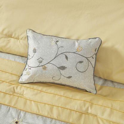 Start2Finish embroidered 7-piece comforter set with detailed floral embroidery and matching pillow shams on a cozy bed.