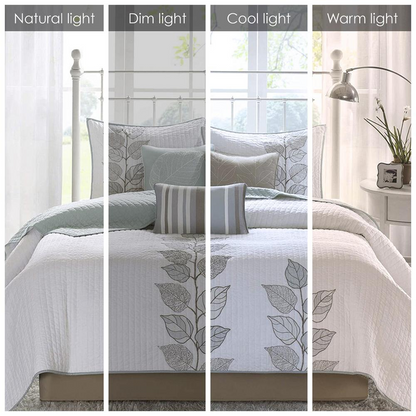 Start2Finish 6-piece embroidered quilt bedding set with matching throw pillows, showcasing intricate stitching and colorful patterns.
