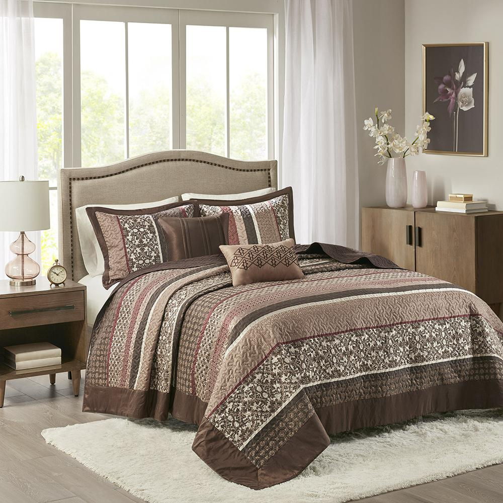 Reversible Jacquard bedspread set with five pieces from Start2Finish, showcasing intricate patterns and textured fabric.