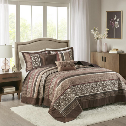 Reversible Jacquard bedspread set with five pieces from Start2Finish, showcasing intricate patterns and textured fabric.