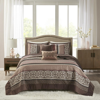Start2Finish 5-piece reversible jacquard bedspread set with intricate floral patterns in neutral tones on a neatly made bed.