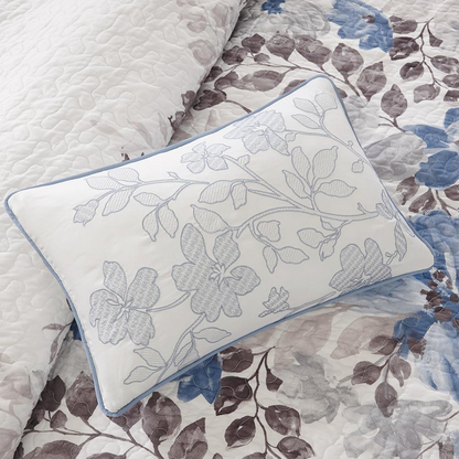Start2Finish 6-piece printed quilt set with matching throw pillows, featuring colorful floral patterns and cozy bedding design