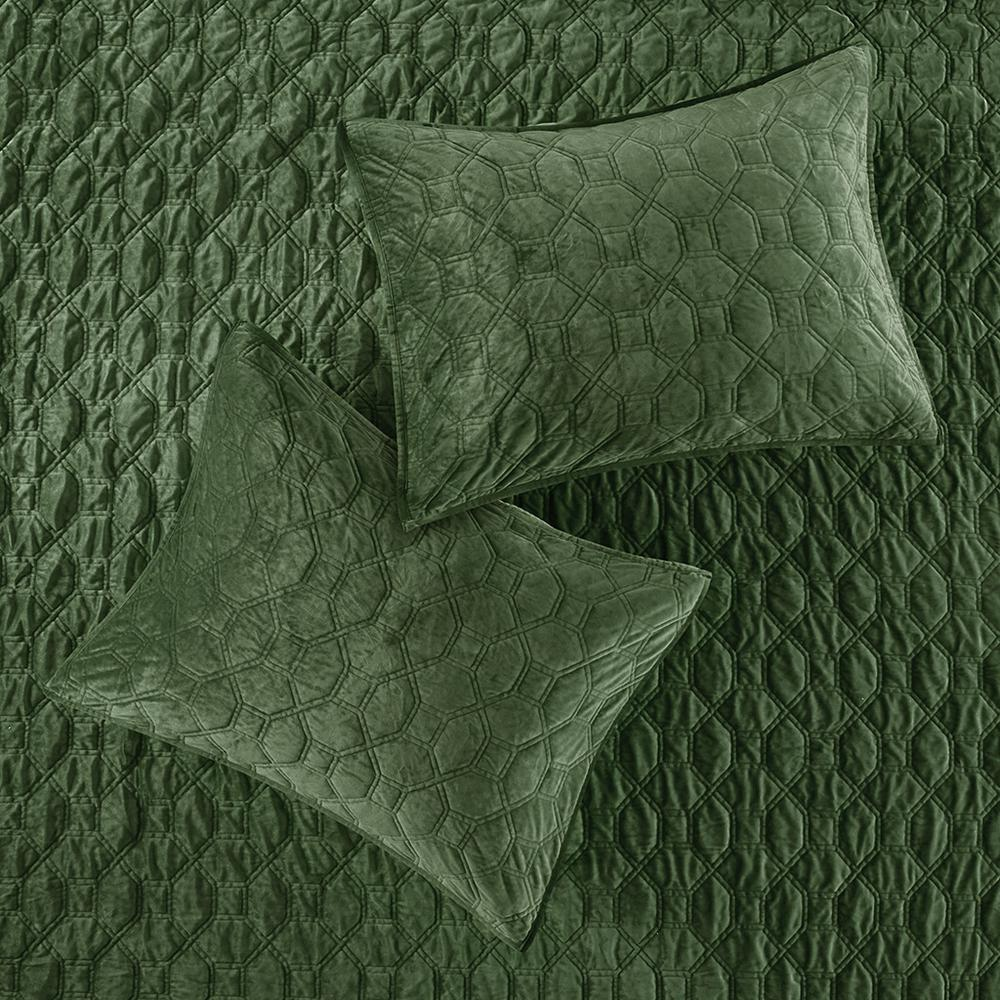 Start2Finish Harper 3-piece velvet quilt set in green with matching pillow shams on a bed.