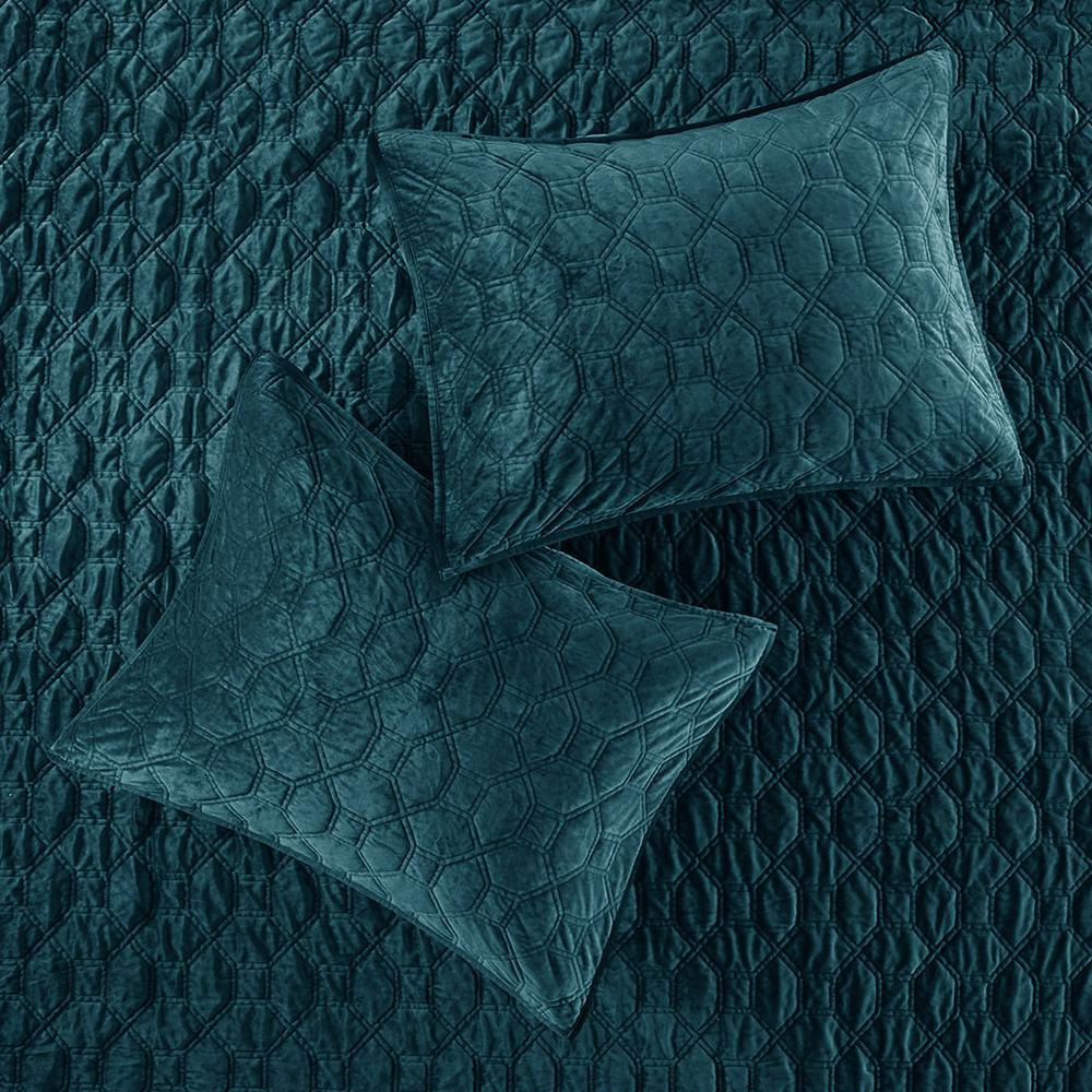 Start2Finish Harper 3-piece velvet quilt set in teal with matching pillow shams on a bed for cozy bedroom decor.
