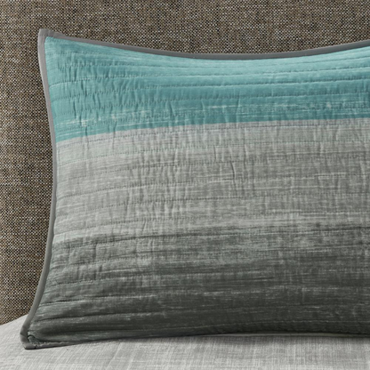 Start2Finish aqua Saben 8-piece quilt set with cotton bed sheets, featuring a patterned quilt and coordinating pillowcases.