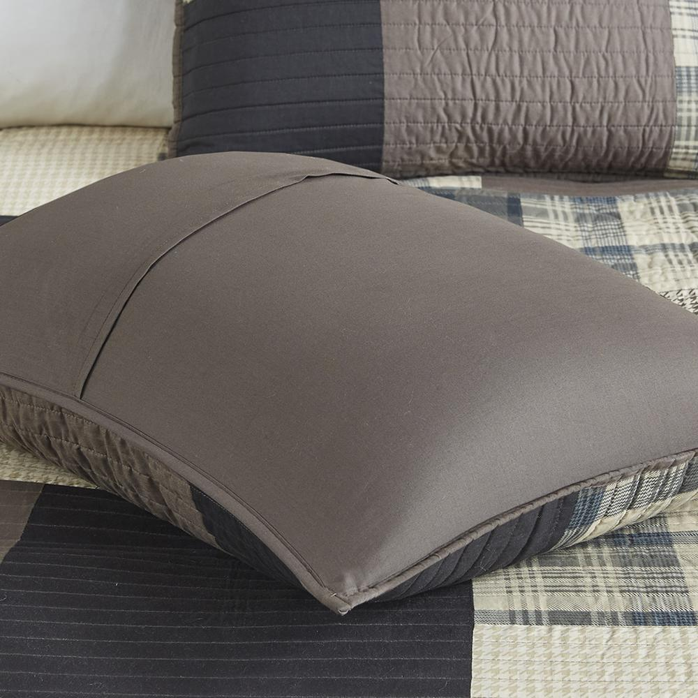 Start2Finish Winter Hills oversized cotton quilt set in tan, showing a cozy, textured quilt draped over a bed with matching pillow shams.