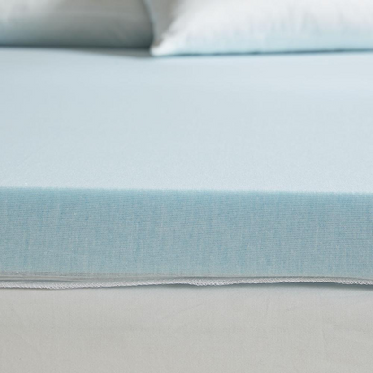 Start2Finish mattress topper showing plush, quilted surface for added comfort and support on a bed.