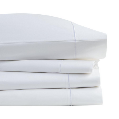 Start2Finish Pima Cotton Sheet Set featuring soft, smooth white sheets with a subtle striped pattern on a neatly made bed.
