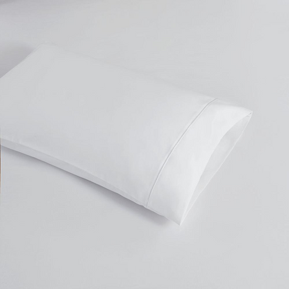 Start2Finish Pima Cotton Sheet Set with smooth, white bedsheets and pillowcases laid out on a bed for a comfortable sleep.