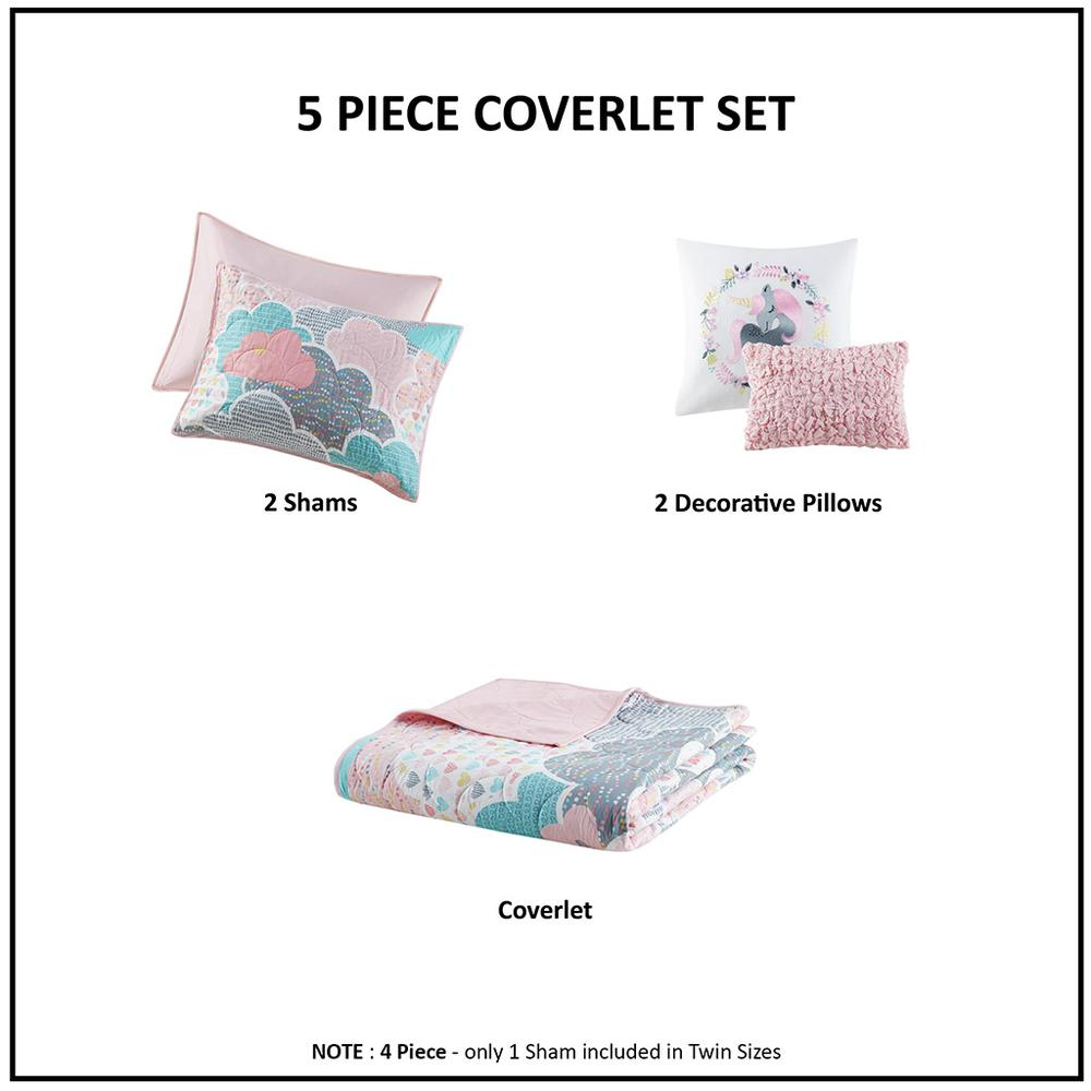 Reversible cotton quilt set with matching throw pillows on a bed, featuring a cozy, stylish bedding design from Start2Finish.