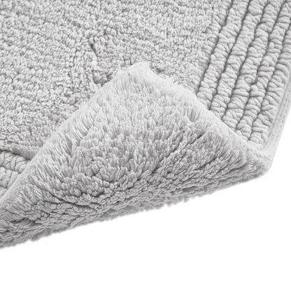 Reversible bath rug by Start2Finish featuring 100% cotton, tufted design, and 3000GSM thickness for plush comfort.