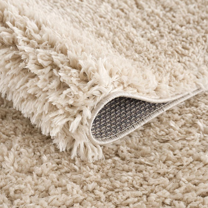 Super soft polyester shag area rug by Start2Finish with plush, textured fibers in a cozy, stylish design.