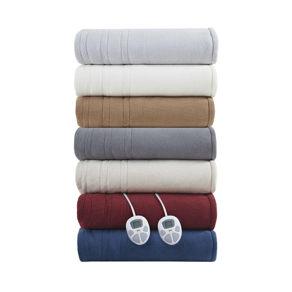 Start2Finish heated blanket spread out on bed, showing soft fabric and control panel for adjustable warmth.