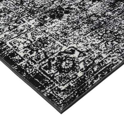 Distressed vintage Persian woven area rug by Start2Finish with intricate pattern and faded, aged appearance.