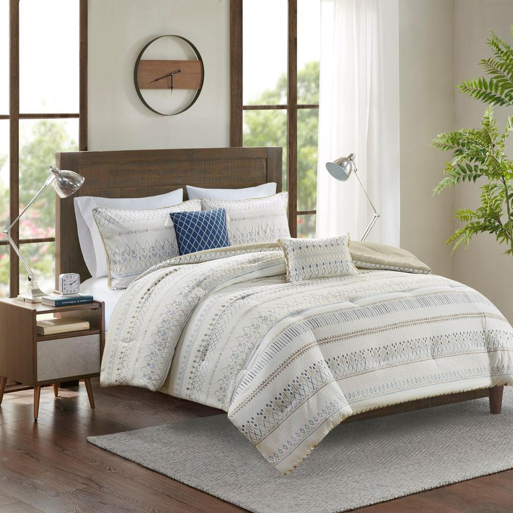 Start2Finish printed seersucker comforter set with matching throw pillows, featuring a colorful, textured bedding design.