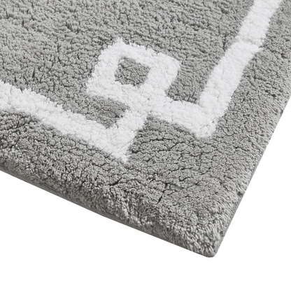 Cotton tufted bath rug in 20x30 inches with plush, textured surface, by Start2Finish, suitable for bathroom decor and comfort.