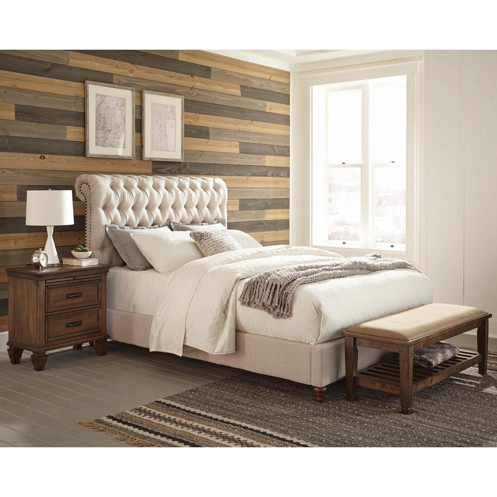 Beige upholstered Devon 57-inch queen panel bed with a padded headboard and wooden frame, shown in a modern bedroom setting.
