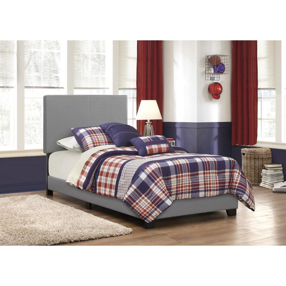Start2Finish Dorian Grey upholstered twin panel bed with padded headboard and sleek grey fabric, shown in a bedroom setting.