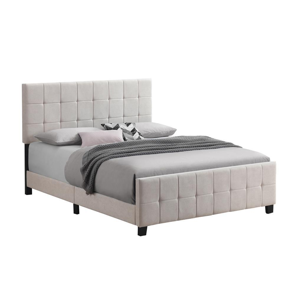 Beige upholstered queen panel bed by Start2Finish with a padded headboard and sleek wooden frame, shown in a modern bedroom setting.