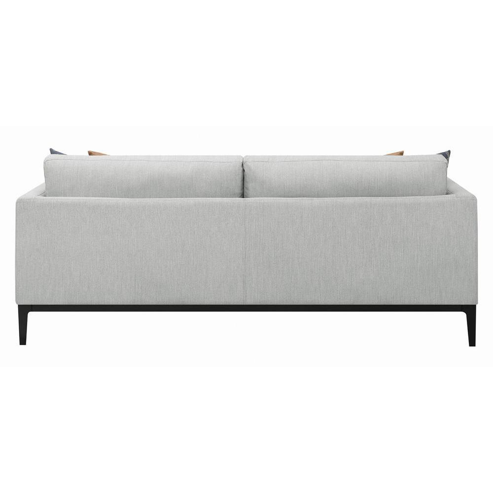 Light grey upholstered Apperson track arm sofa by Start2Finish with plush cushions and sleek design in a modern living room setting