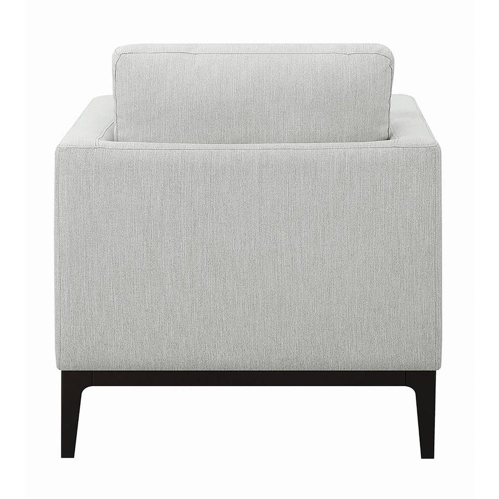 Light grey upholstered Apperson accent chair with track arms and cushioned seat, modern furniture by Start2Finish.