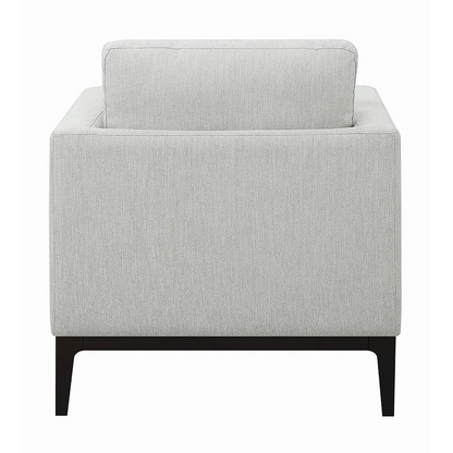 Light grey upholstered Apperson accent chair with track arms and cushioned seat, modern furniture by Start2Finish.