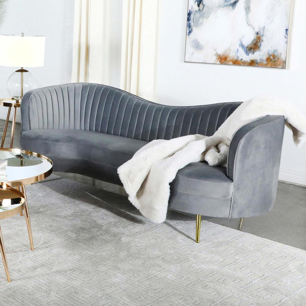 Grey Sophia upholstered channel tufted sofa by Start2Finish with button-tufted back and modern design, shown from a side view.