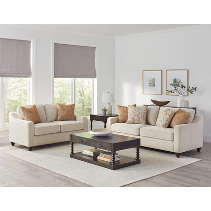 Beige Christine upholstered loveseat with sloped arms, featuring plush fabric and comfortable cushioning for cozy living spaces.
