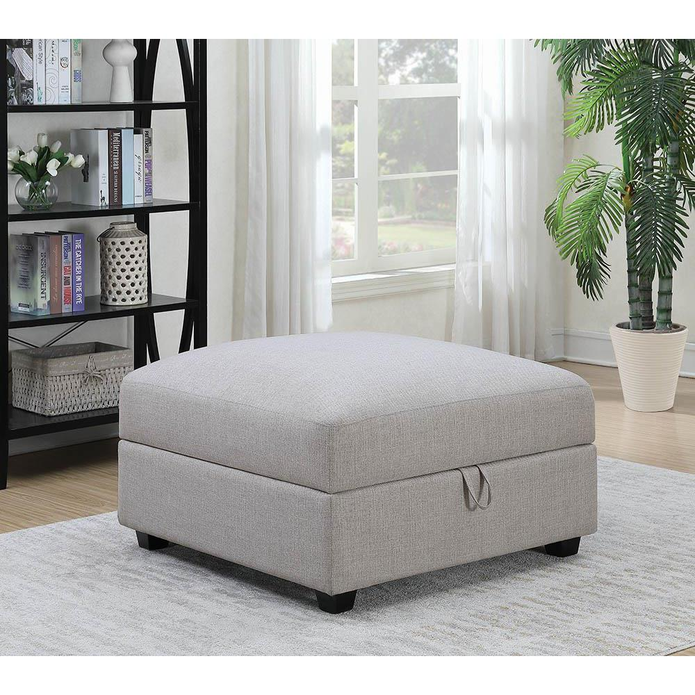 Grey Cambria Square Upholstered Storage Ottoman from Start2Finish, showing its soft fabric and sturdy wooden legs.
