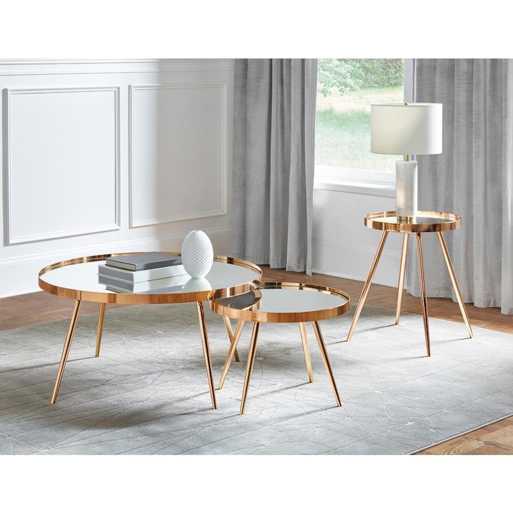 Start2Finish Kaelyn round mirror top end table with a gold finish, showcasing its elegant circular surface and modern design.