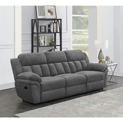 Start2Finish Bahrain upholstered motion sofa in charcoal fabric with plush cushions and modern design.