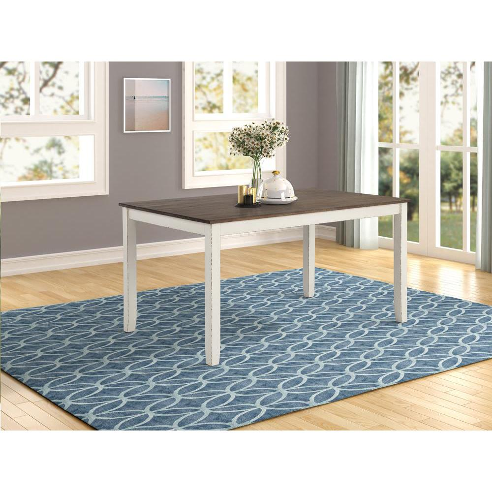Fortress 7-piece rectangular dining set by Start2Finish with vintage vanilla finish, featuring a table and six matching chairs.