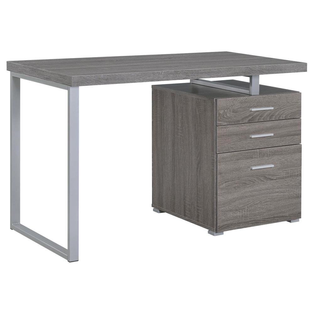 Weathered grey Brennan 47-inch office computer desk with three drawers by Start2Finish, featuring a sturdy wood finish and modern design.