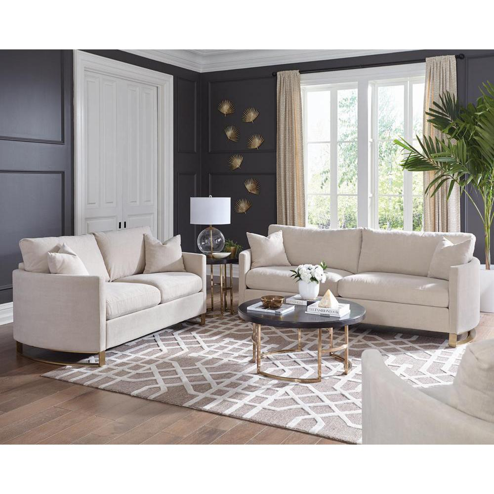 Corliss upholstered arched arm sofa in beige with plush cushions and wooden legs, modern furniture piece by Start2Finish.