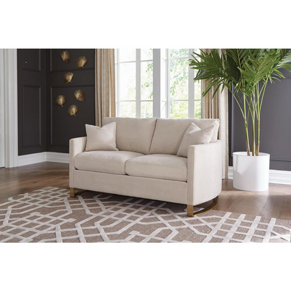 Beige Corliss upholstered arched arm loveseat by Start2Finish, featuring plush fabric and a stylish curved backrest.