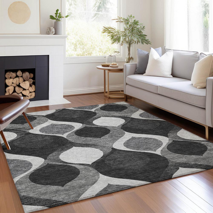 Start2Finish Chantille ACN749 black rug, 10x14 feet, with a plush, textured surface and intricate pattern in a modern design.
