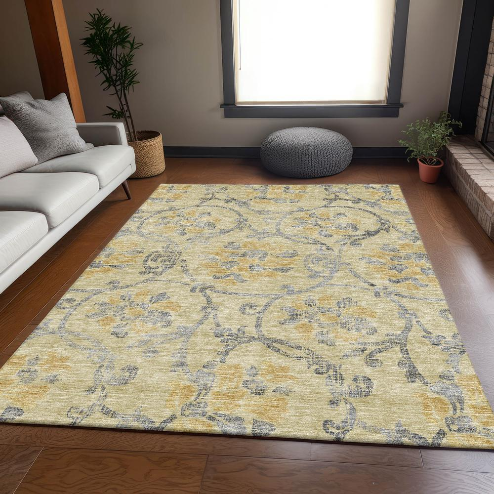 Start2Finish Chantille ACN762 gold 8x10 rug featuring intricate patterns and a soft textured surface.