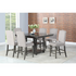 Start2Finish Caswell 7-piece counter set with sleek stainless steel utensils and black handles on a modern kitchen countertop.