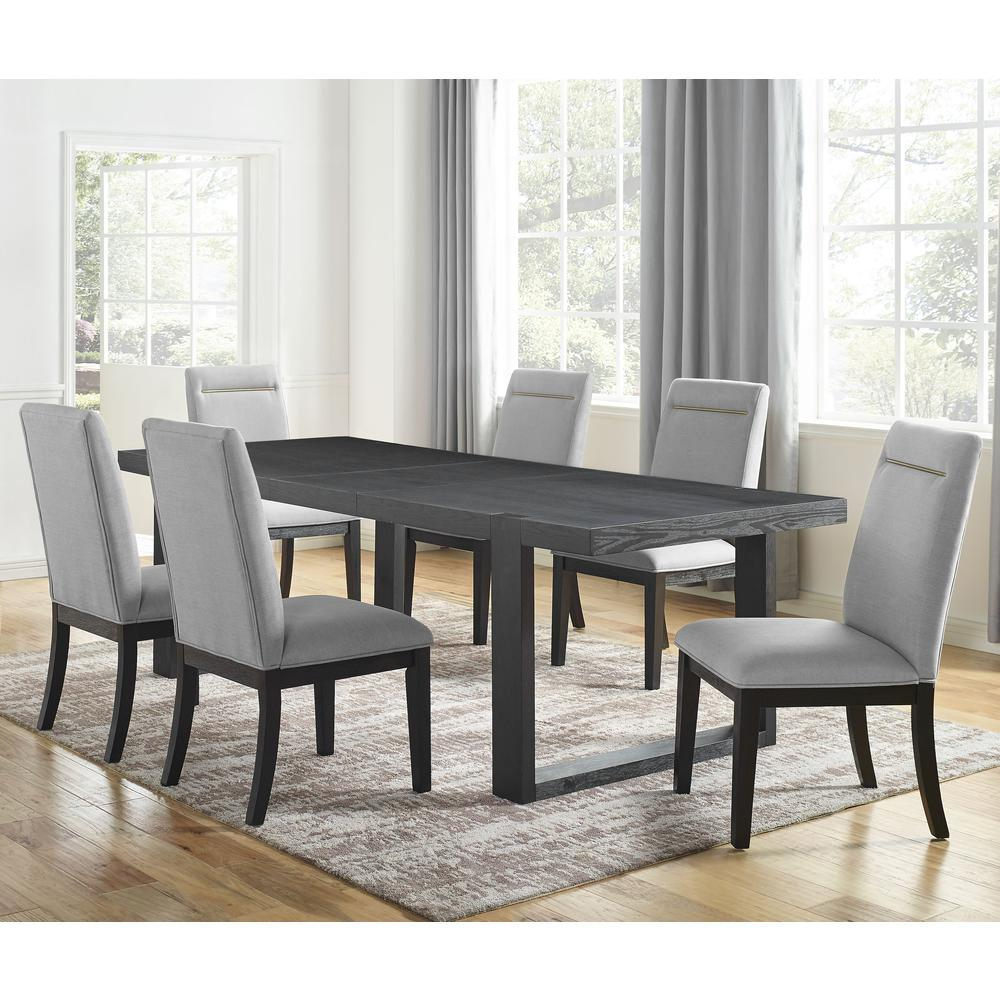 Yves black wooden dining table with six grey upholstered chairs, modern start2finish dining set on a hardwood floor.