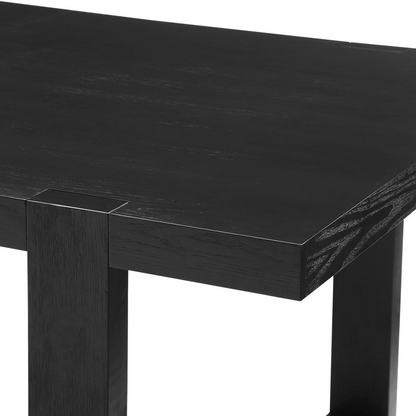 Yves black dining table with six grey chairs in a modern dining room setting, showcasing stylish Start2Finish furniture.