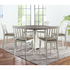 Joanna 7-piece counter dining set by Start2Finish featuring a wooden table and matching chairs for casual dining.