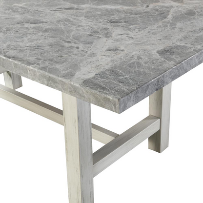 Start2Finish Canova gray marble top dining table with sleek, polished surface and sturdy wooden legs.
