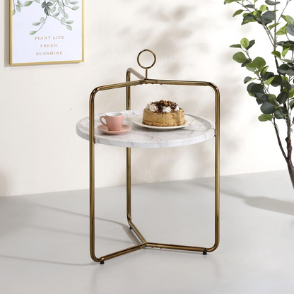 White and gold Miro side table by Start2Finish, showcasing a sleek modern furniture design with a round top and slim legs.