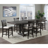 Start2Finish Napa 7-piece counter height dining set with chairs and table in a modern design, shown in a living room setting.