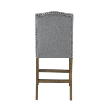 Gray start2finish Grayson counter chair with nailhead trim, showcasing a stylish upholstered furniture piece with wooden legs.