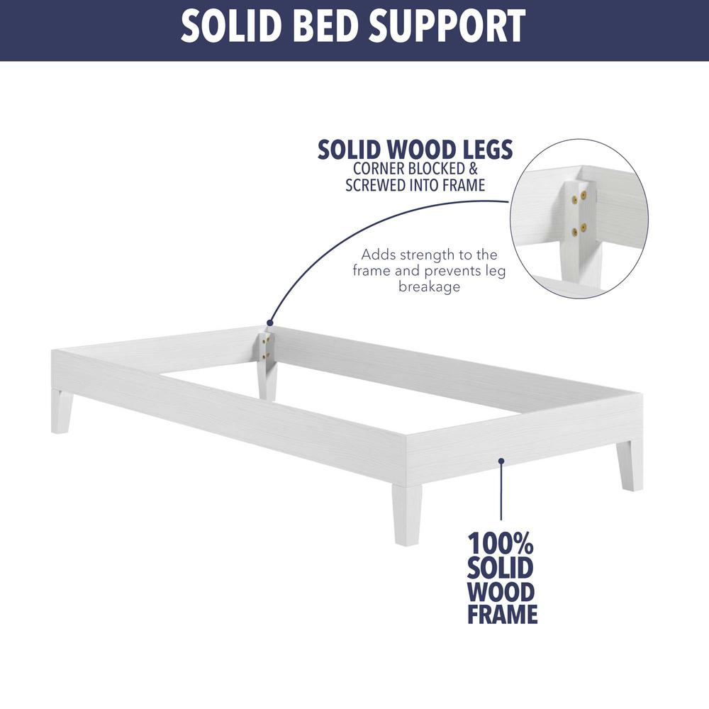 White solid wood twin platform bed by Start2Finish, showcasing a sturdy frame and simple design in a bedroom setting.