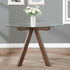 Start2Finish Wade 48-inch round glass top dining table with sleek metal legs, perfect for modern dining rooms.